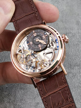Rose Gold skeleton watch with brown leather strap
