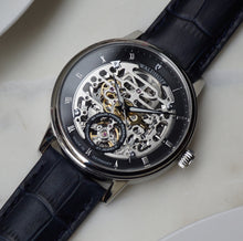 Classic men's watch on black leather strap