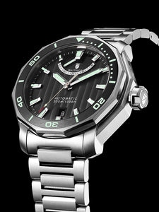 Black dive watch on steel bracelet