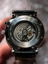 Silver multifunction automatic watch caseback