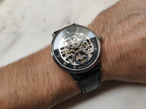 Classic men's watch on black leather strap wristshot