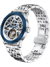 Skeleton tourbillon watch with blue bezel on a steel bracelet