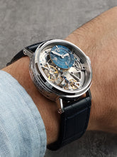 Skeleton watch with blue leather strap wristshot