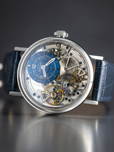 Skeleton watch with blue leather strap