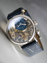 Skeleton watch with blue leather strap